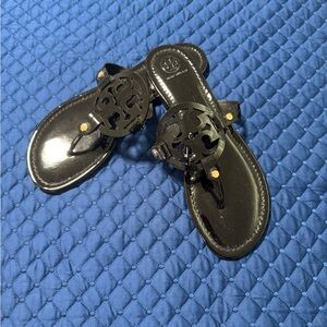 Tory Burch Black Sandals with Gold Accents